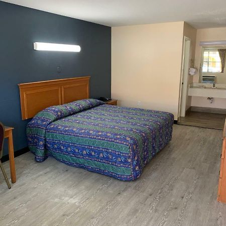 Guest Inn And Suites Houston Habitación foto