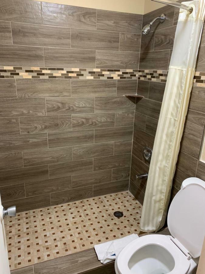 Guest Inn And Suites Houston Habitación foto