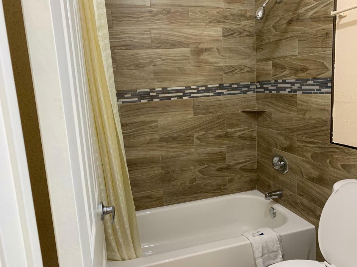 Guest Inn And Suites Houston Habitación foto