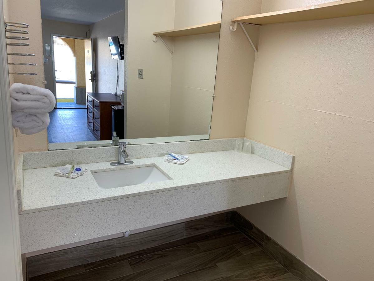 Guest Inn And Suites Houston Habitación foto